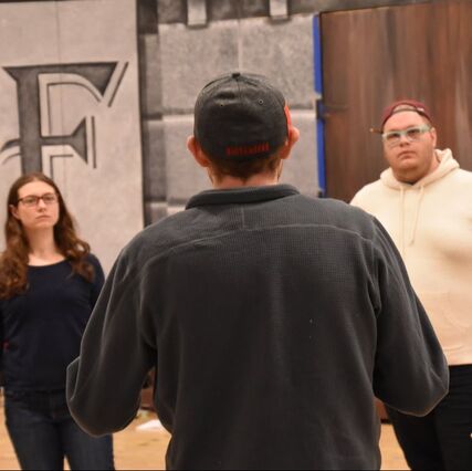 SPCT Director provides guidance to actors at a rehearsal